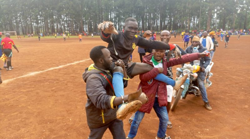 Fans carry goalkeeper at end of match at the Nkambe Municipal stadium (Photo by Fai Gideon Sport)