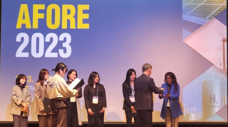 Christelle receiving an award. Photo/Courtesy